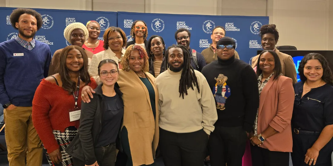 Black and Latino Adult Achievers gather for a photo at the Albany Black Chamber of Commerce