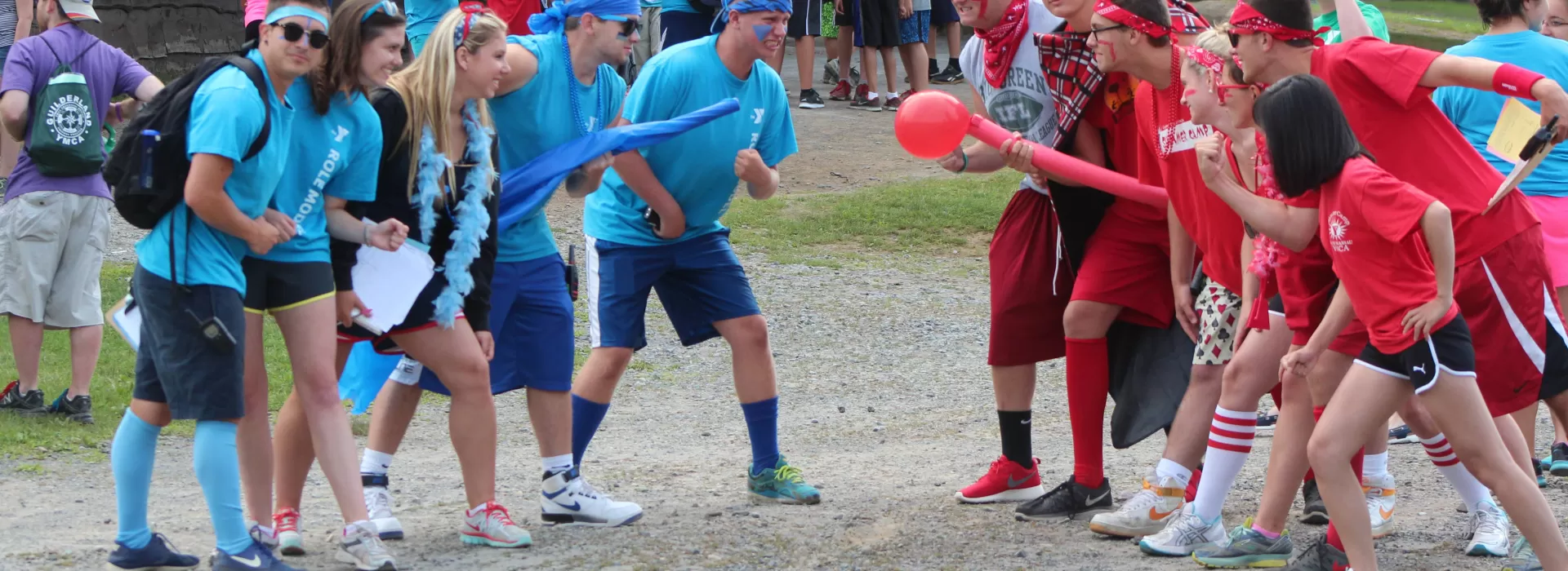 kids in red and blue getting ready to compete